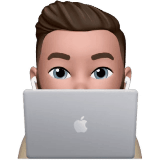 Memoji of Lefos, working on a laptop